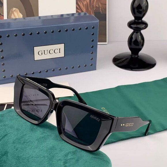 Gucci Accessories - Gucci Black Sunglasses with Gold Logo